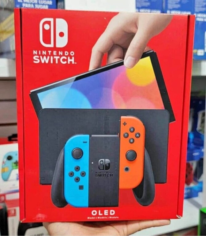 nintendo-switch-oled-brand-new-sealed-with-two-extra-games-big-0
