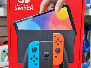 Nintendo switch oled( brand new & sealed with two extra games )