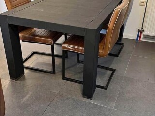 Large black table with 4 chairs